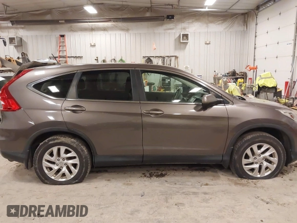 2015 Honda CR-V EX with VIN 2HKRM4H56FH670649, listed as a IAAI auction lot 42007616 with 142,353 mi miles and . Bid and sale history available at DreamBid. Image 13.