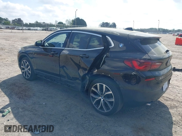 2022 BMW X2 sDrive28i z VIN WBXYH9C00N5U57853, wystawiony jako IAAI lot #41958326 z przebiegiem 49 518 mil mil oraz . Historia ofert i sprzedaży dostępna na DreamBid. Obrazek 3.