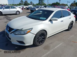 2016 Nissan Altima SR with VIN 1N4AL3AP0GC187327, listed as a IAAI auction lot 42001667 with 175,649 mi miles and . Bid and sale history available at carsss.com. Image 2.