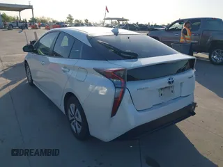 2017 Toyota Prius Two with VIN JTDKARFU4H3535752, listed as a IAAI auction lot 41975718 with 304,314 mi miles. Bid and sale history available at carsss.com. Image 3.