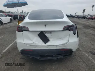 2023 Tesla Model Y Long Range with VIN 7SAYGDEE3PF583883, listed as a Copart auction lot 50920145 with 72,155 mi miles and Salvage Title. Bid and sale history available at DreamBid. Image 6.