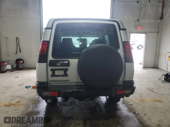 2004 Land Rover Discovery SE z VIN SALTW19404A850159, wystawiony jako Copart lot #51779445 z przebiegiem 166 321 mil mil oraz Szkoda całkowita • Salvage title. Historia ofert i sprzedaży dostępna na DreamBid. Obrazek 6.