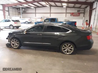 2015 Chevrolet Impala LTZ with VIN 2G1165S33F9136329, listed as a IAAI auction lot 41639698 with 198,027 mi miles. Bid and sale history available at carsss.com. Image 14.