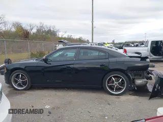 2014 Dodge Charger SE with VIN 2C3CDXBG2EH187978, listed as a IAAI auction lot 41246875 with 106,635 mi miles and . Bid and sale history available at DreamBid. Image 14.