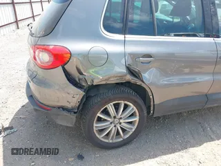 2011 Volkswagen Tiguan SEL w/Premium Navi with VIN WVGAV7AX0BW550059, listed as a IAAI auction lot 42071719 with 107,341 mi miles and . Bid and sale history available at DreamBid. Image 6.