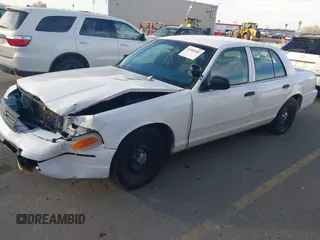2000 Ford Crown Victoria Police Interceptor z VIN 2FAFP71W9YX149303, wystawiony jako IAAI lot #41888402 z przebiegiem 148 081 mil mil oraz . Historia ofert i sprzedaży dostępna na DreamBid. Obrazek 17.