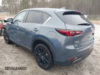2023 Mazda CX-5 2.5 S Preferred Package with VIN JM3KFBCM0P0277203, listed as a IAAI auction lot 41799312 with 28,526 mi miles. Bid and sale history available at carsss.com. Image 3.