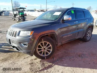 2014 Jeep Grand Cherokee Limited with VIN 1C4RJFBG9EC232426, listed as a IAAI auction lot 41432622 with 154,016 mi miles. Bid and sale history available at carsss.com. Image 2.