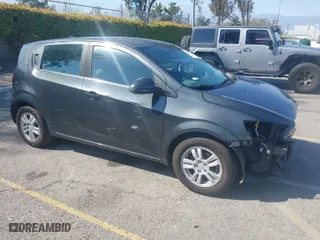 2014 Chevrolet Sonic LT with VIN 1G1JC6SG4E4118781, listed as a IAAI auction lot 41862192 with 124,375 mi miles. Bid and sale history available at carsss.com. Image 1.
