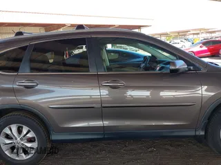 2014 Honda CR-V EX-L with VIN 2HKRM4H72EH665478, listed as a IAAI auction lot 41970335 with 119,557 mi miles. Bid and sale history available at carsss.com. Image 12.