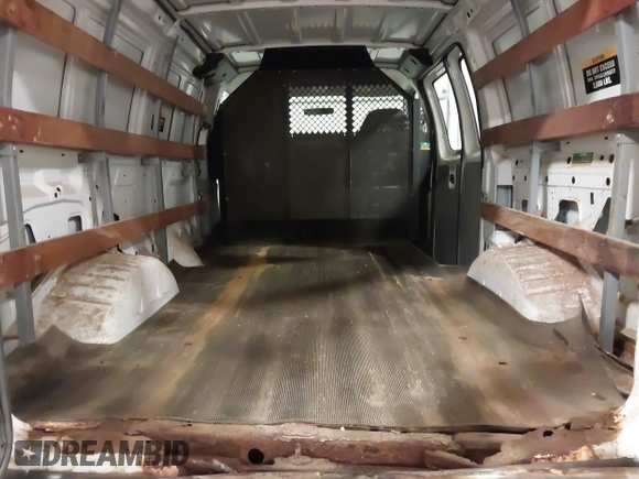2006 Ford Econoline Cargo with VIN 1FTNE24W56DA13331, listed as a IAAI auction lot 41822424 with 370,496 mi miles and . Bid and sale history available at DreamBid. Image 18.