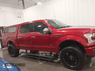 2015 Ford F-150 XLT with VIN 1FTEW1EG5FFB90898, listed as a IAAI auction lot 41617424 with 128,587 mi miles. Bid and sale history available at carsss.com. Image 14.