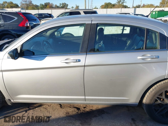 2012 Chrysler 200 S with VIN 1C3CCBHGXCN188538, listed as a IAAI auction lot 41085313 with 107,002 mi miles and . Bid and sale history available at DreamBid. Image 13.