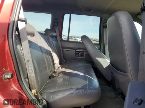 2000 Ford Explorer Eddie Bauer z VIN 1FMZU74E3YZB27368, wystawiony jako Copart lot #45900545 z przebiegiem 154 651 mil mil oraz Szkoda całkowita • Salvage title. Historia ofert i sprzedaży dostępna na DreamBid. Obrazek 11.