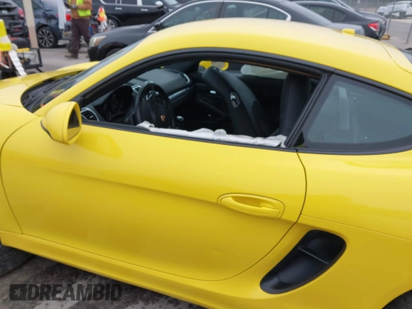 2014 Porsche Cayman with VIN WP0AA2A84EK172111, listed as a IAAI auction lot 41581508 with 91,509 mi miles and . Bid and sale history available at DreamBid. Image 14.