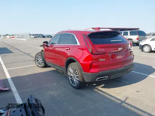 2025 Cadillac XT4 AWD Premium Luxury with VIN 1GYFZDR42SF118428, listed as a IAAI auction lot 42376074 with 13,758 mi miles and . Bid and sale history available at DreamBid. Image 3.