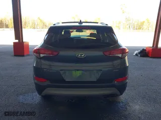 2018 Hyundai Tucson Value with VIN KM8J3CA20JU762120, listed as a IAAI auction lot 41878796 with 103,346 mi miles. Bid and sale history available at carsss.com. Image 16.