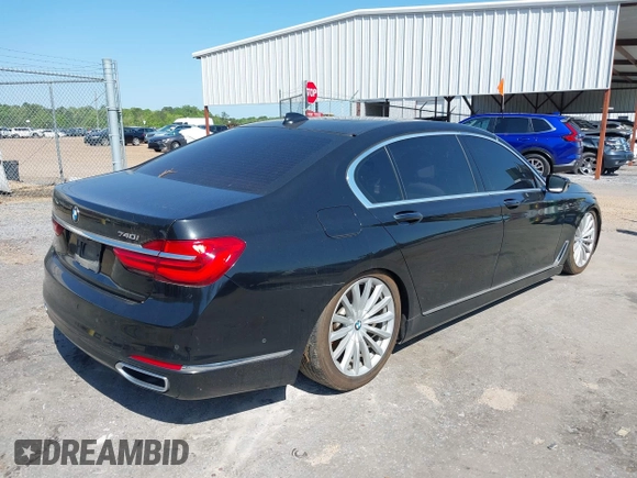 2016 BMW 7 Series 740i with VIN WBA7E2C55GG547752, listed as a IAAI auction lot 41992704 with Not Provided miles and . Bid and sale history available at carsss.com. Image 4.