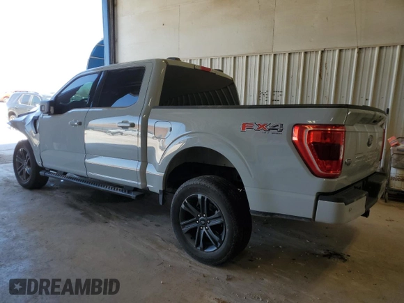 2023 Ford F-150 XL with VIN 1FTFW1E88PFD22387, listed as a Copart auction lot 49795405 with 14,057 mi miles and Salvage Title. Bid and sale history available at carsss.com. Image 2.