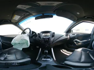 2016 Hyundai Veloster Turbo с VIN KMHTC6AE2GU288538, выставлен на аукционе IAAI как лот 42282122 с пробегом 83 231 миль миль и . История ставок и продаж доступна на DreamBid. Изображение 19.