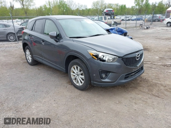 2014 Mazda CX-5 Touring with VIN JM3KE2CYXE0332517, listed as a IAAI auction lot 42109592 with 138,214 mi miles. Bid and sale history available at carsss.com. Image 1.