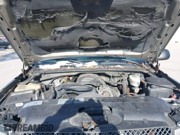 2003 Chevrolet Silverado 1500 LS with VIN 2GCEK19V231240843, listed as a IAAI auction lot 41439844 with 351,433 mi miles. Bid and sale history available at carsss.com. Image 10.