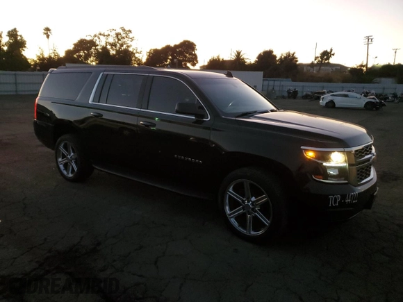 2020 Chevrolet Suburban LS with VIN 1GNSCGKC9LR104008, listed as a Copart auction lot 73351014 with 63,474 mi miles and Salvage title. Bid and sale history available at DreamBid. Image 4.