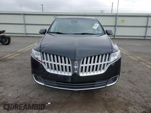 2010 Lincoln MKT with VIN 2LMHJ5AR0ABJ10301, listed as a Copart auction lot 74628944 with 111,986 mi miles and Salvage Title. Bid and sale history available at DreamBid. Image 5.