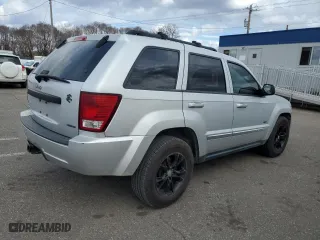 2008 Jeep Grand Cherokee Laredo with VIN 1J8HR48MX8C233846, listed as a Copart auction lot 50766955 with 134,404 mi miles and Salvage Title. Bid and sale history available at carsss.com. Image 3.