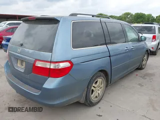 2007 Honda Odyssey EX-L with VIN 5FNRL38717B127157, listed as a IAAI auction lot 41890838 with 195,241 mi miles and . Bid and sale history available at DreamBid. Image 4.
