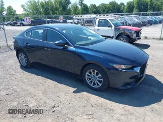 2021 Mazda 3 S with VIN JM1BPAALXM1341814, listed as a IAAI auction lot 42797513 with 32,167 mi miles and . Bid and sale history available at DreamBid. Image 1.