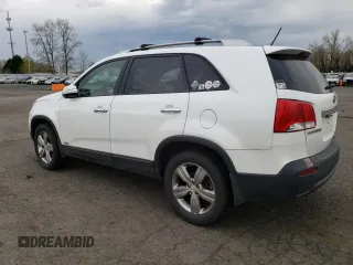 2013 Kia Sorento EX with VIN 5XYKUCA62DG406430, listed as a Copart auction lot 49768465 with 106,438 mi miles and Salvage Title. Bid and sale history available at carsss.com. Image 2.