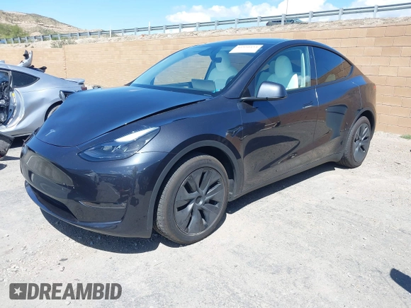 2024 Tesla Model Y Long Range z VIN 7SAYGAEE8RF198286, wystawiony jako IAAI lot #41950454 z przebiegiem 7 611 mil mil oraz . Historia ofert i sprzedaży dostępna na DreamBid. Obrazek 17.