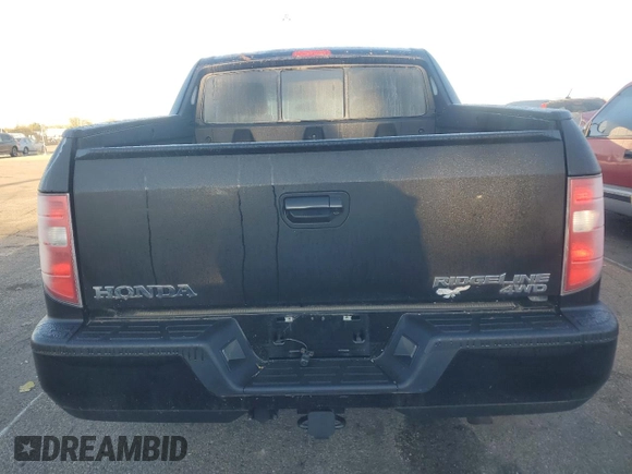 2010 Honda Ridgeline RTL with VIN 5FPYK1F58AB007262, listed as a Copart auction lot 74173034 with 94,078 mi miles and Salvage Title. Bid and sale history available at carsss.com. Image 6.