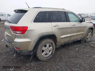 2011 Jeep Grand Cherokee Laredo with VIN 1J4RR4GG9BC563065, listed as a IAAI auction lot 41798136 with 192,149 mi miles. Bid and sale history available at carsss.com. Image 4.