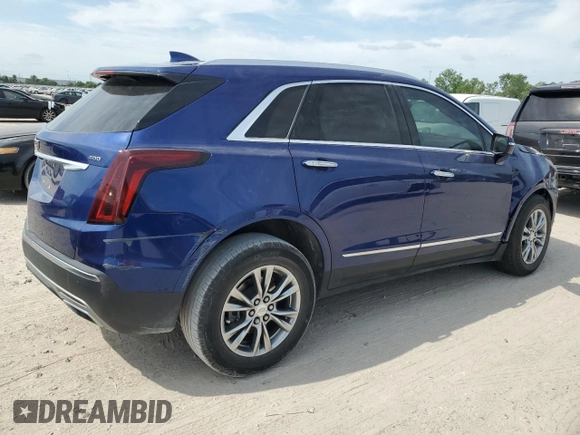 2023 Cadillac XT5 FWD Premium Luxury with VIN 1GYKNCRS3PZ154122, listed as a Copart auction lot 53667425 with 52,279 mi miles and Salvage Title. Bid and sale history available at carsss.com. Image 3.