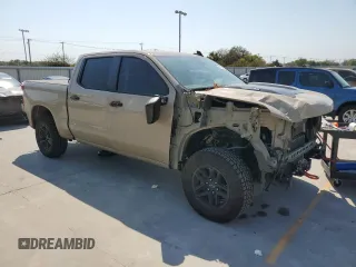 2022 Chevrolet Silverado 1500 LT Trail Boss with VIN 3GCUDFET0NG580297, listed as a Copart auction lot 74712344 with 64,717 mi miles and Salvage Title. Bid and sale history available at DreamBid. Image 4.