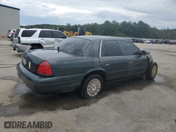 2003 Ford Police Interceptor Street Appear z VIN 2FAFP71WX3X104802, wystawiony jako Copart lot #60667985 z przebiegiem 189 373 mil mil oraz Szkoda całkowita • Salvage title. Historia ofert i sprzedaży dostępna na DreamBid. Obrazek 3.