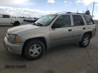 2003 Chevrolet TrailBlazer LS with VIN 1GNDS13SX32106549, listed as a Copart auction lot 51654065 with 115,676 mi miles and Salvage Title. Bid and sale history available at carsss.com. Image 1.