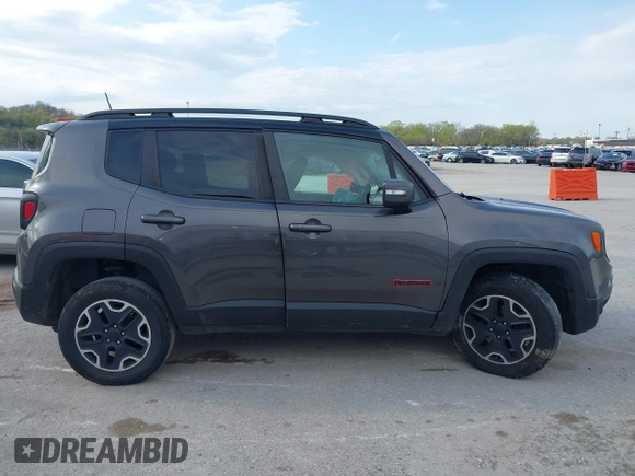 2017 Jeep Renegade Deserthawk with VIN ZACCJBCB2HPF51653, listed as a IAAI auction lot 41994419 with 115,444 mi miles and . Bid and sale history available at DreamBid. Image 13.