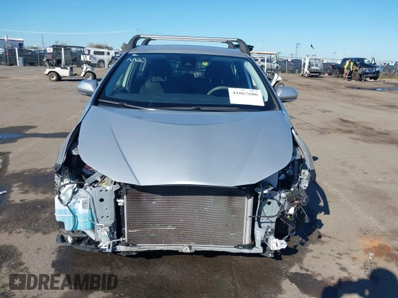 2021 Toyota Prius L Eco with VIN JTDKAMFU5M3130478, listed as a IAAI auction lot 41867606 with 52,223 mi miles. Bid and sale history available at carsss.com. Image 6.