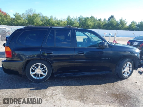 2006 GMC Envoy Denali with VIN 1GKET63M462257064, listed as a IAAI auction lot 40793921 with 179,304 mi miles. Bid and sale history available at carsss.com. Image 14.