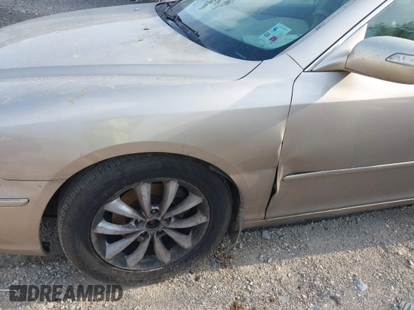 2007 Hyundai Azera SE z VIN KMHFC46F67A162638, wystawiony jako IAAI lot #42053153 z przebiegiem 130 133 mil mil oraz . Historia ofert i sprzedaży dostępna na DreamBid. Obrazek 6.