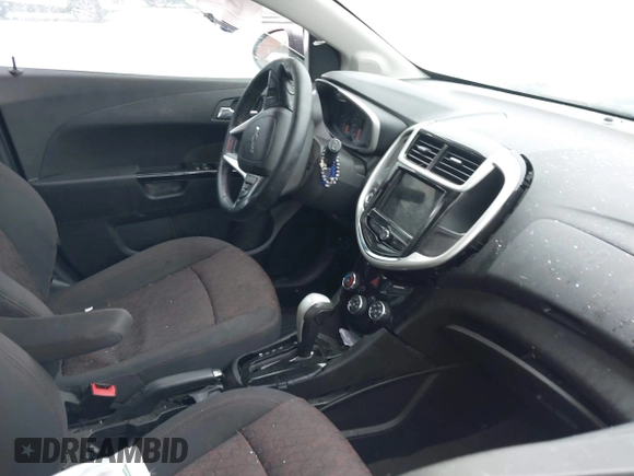 2018 Chevrolet Sonic LT z VIN 1G1JD6SB4J4106822, wystawiony jako IAAI lot #41591103 z przebiegiem 74 497 mil mil oraz . Historia ofert i sprzedaży dostępna na DreamBid. Obrazek 5.