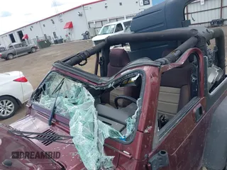 2003 Jeep Wrangler X z VIN 1J4FA39S73P349014, wystawiony jako IAAI lot #42582747 z przebiegiem 50 525 mil mil oraz . Historia ofert i sprzedaży dostępna na DreamBid. Obrazek 6.