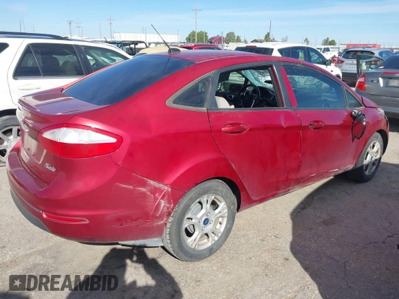 2016 Ford Fiesta SE with VIN 3FADP4BJ1GM104505, listed as a IAAI auction lot 38973344 with 90,996 mi miles. Bid and sale history available at carsss.com. Image 4.