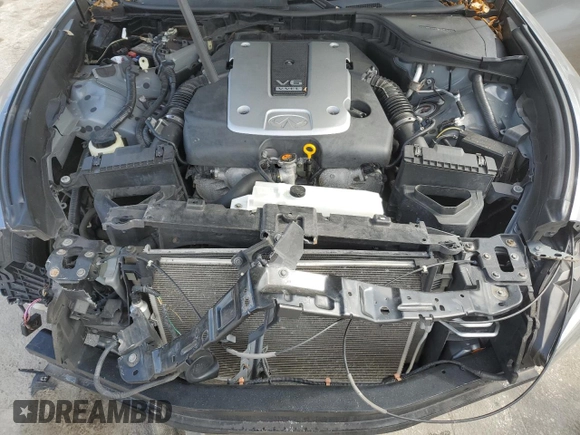 2015 Infiniti Q70 z VIN JN1BY1PR9FM831870, wystawiony jako Copart lot #46022015 z przebiegiem 144 553 mil mil oraz Szkoda całkowita • Salvage title. Historia ofert i sprzedaży dostępna na DreamBid. Obrazek 12.