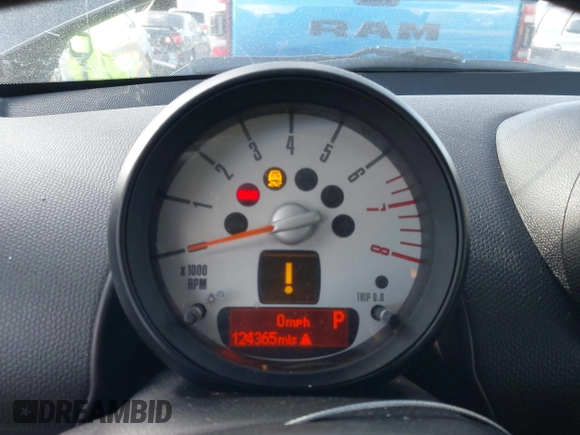 2013 MINI Countryman S with VIN WMWZC3C52DWP21475, listed as a IAAI auction lot 41215334 with 124,365 mi miles and . Bid and sale history available at DreamBid. Image 7.