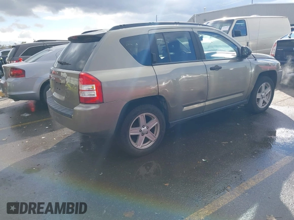 2007 Jeep Compass Sport with VIN 1J8FF47W37D325148, listed as a IAAI auction lot 40962150 with 198,345 mi miles. Bid and sale history available at carsss.com. Image 4.