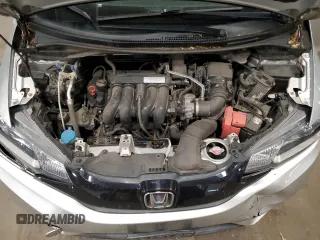 2015 Honda Fit LX с VIN 3HGGK5H56FM720996, выставлен на аукционе Copart как лот 57565945 с пробегом 90 222 миль миль и Списание • Salvage title. История ставок и продаж доступна на DreamBid. Изображение 12.